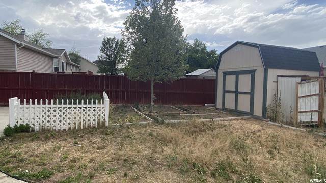 26. Single Family Homes for Sale at 5064 OLD CREEK Road West Jordan, Utah 84081 United States