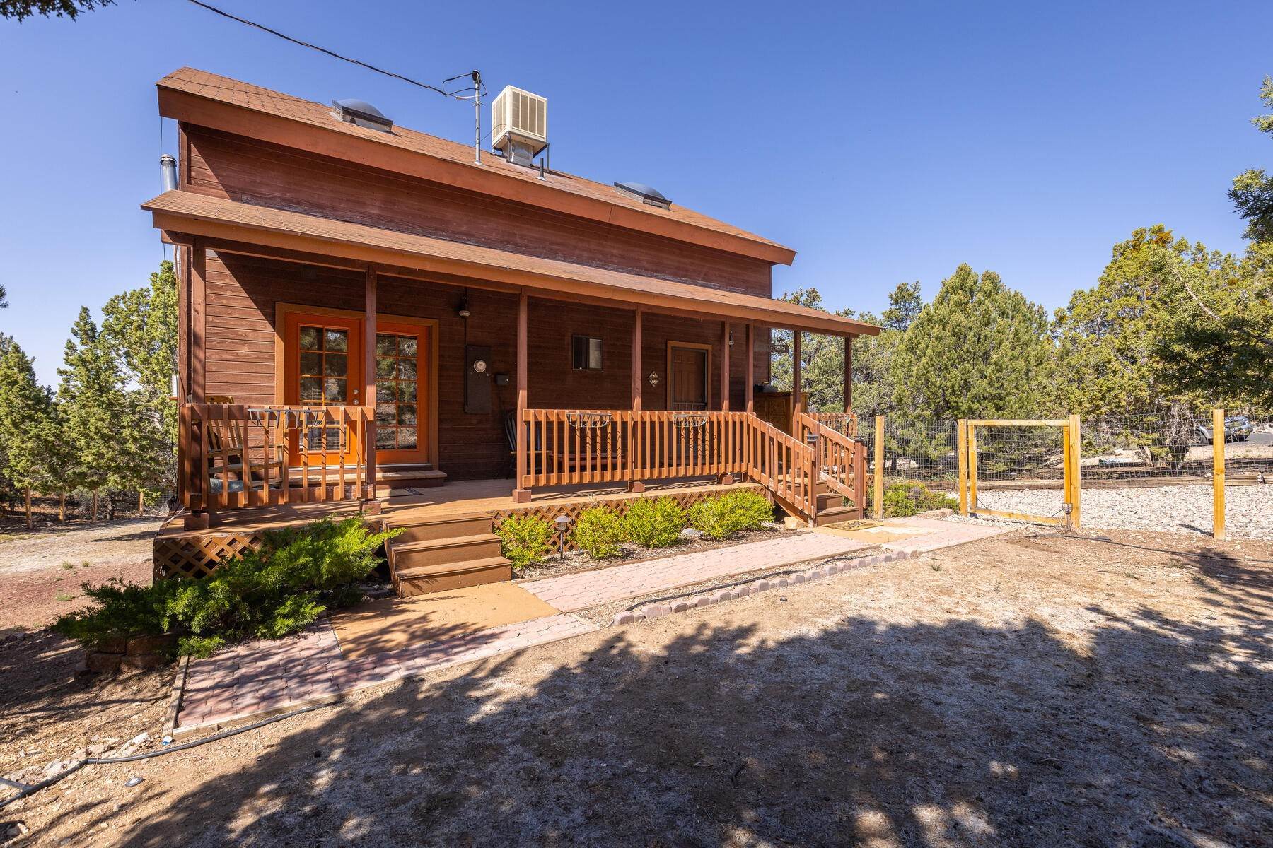 2. Single Family Homes for Sale at Cozy Log Home In Central 682 E Mule Deer Road Central, Utah 84722 United States