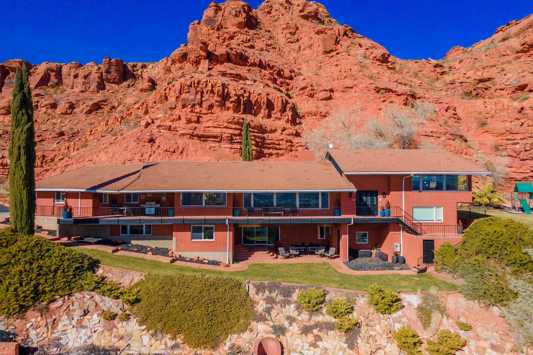 Single Family Homes for Sale at Rare Mid-Modern-Century Nestled In The Red Buttes Overlooking St. George 550 North 160 West Circle St. George, Utah 84770 United States