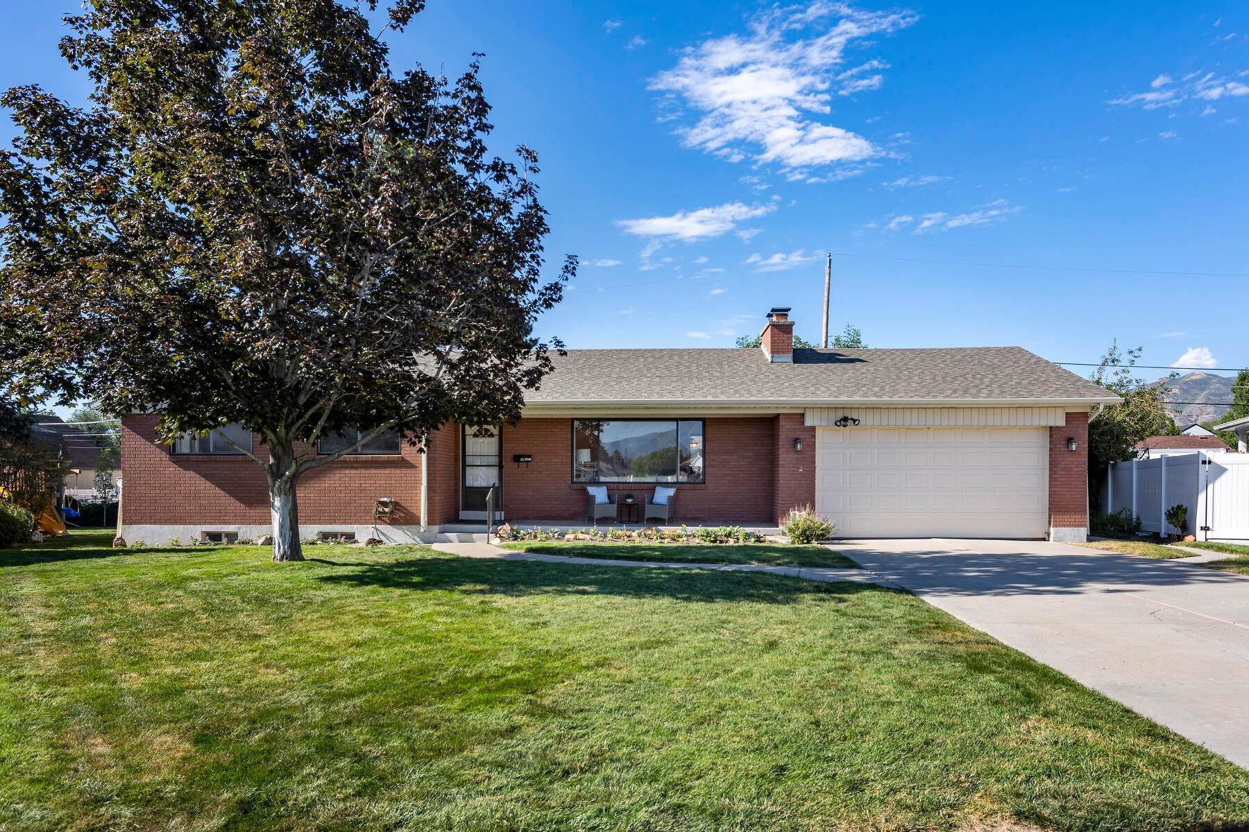 Single Family Homes for Sale at Beautifully Appointed Millcreek Rambler 3048 S Marie Cir Salt Lake City, Utah 84109 United States