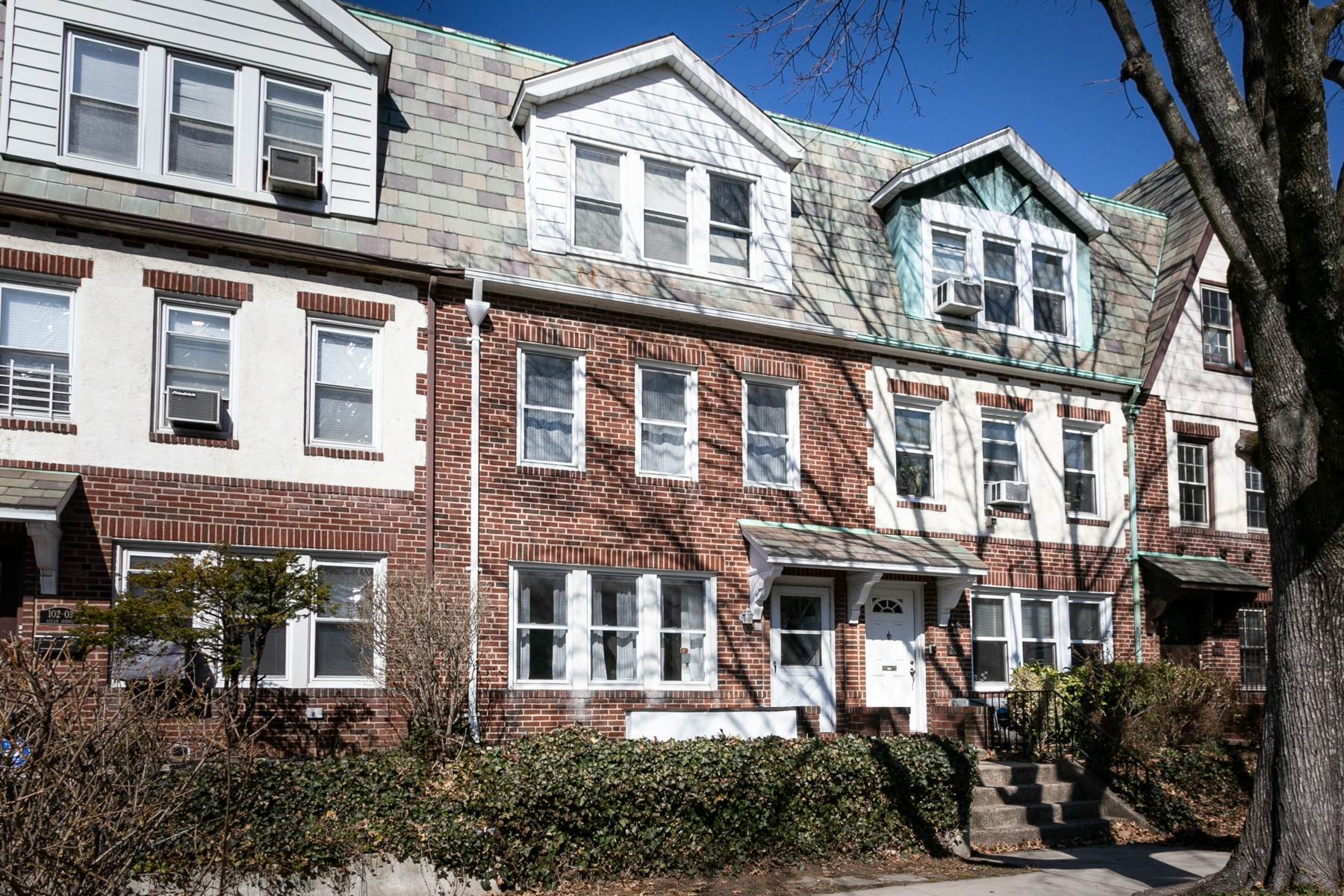 Multi-Family Homes for Sale at BRIGHT & AIRY TWO FAMILY 205 Ascan Avenue Forest Hills, New York 11375 United States