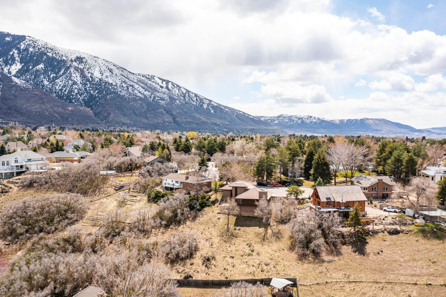 49. Single Family Homes for Sale at Mid Century Modern Home with Views of Little Cottonwood Canyon 2496 E Charros Rd Sandy, Utah 84092 United States