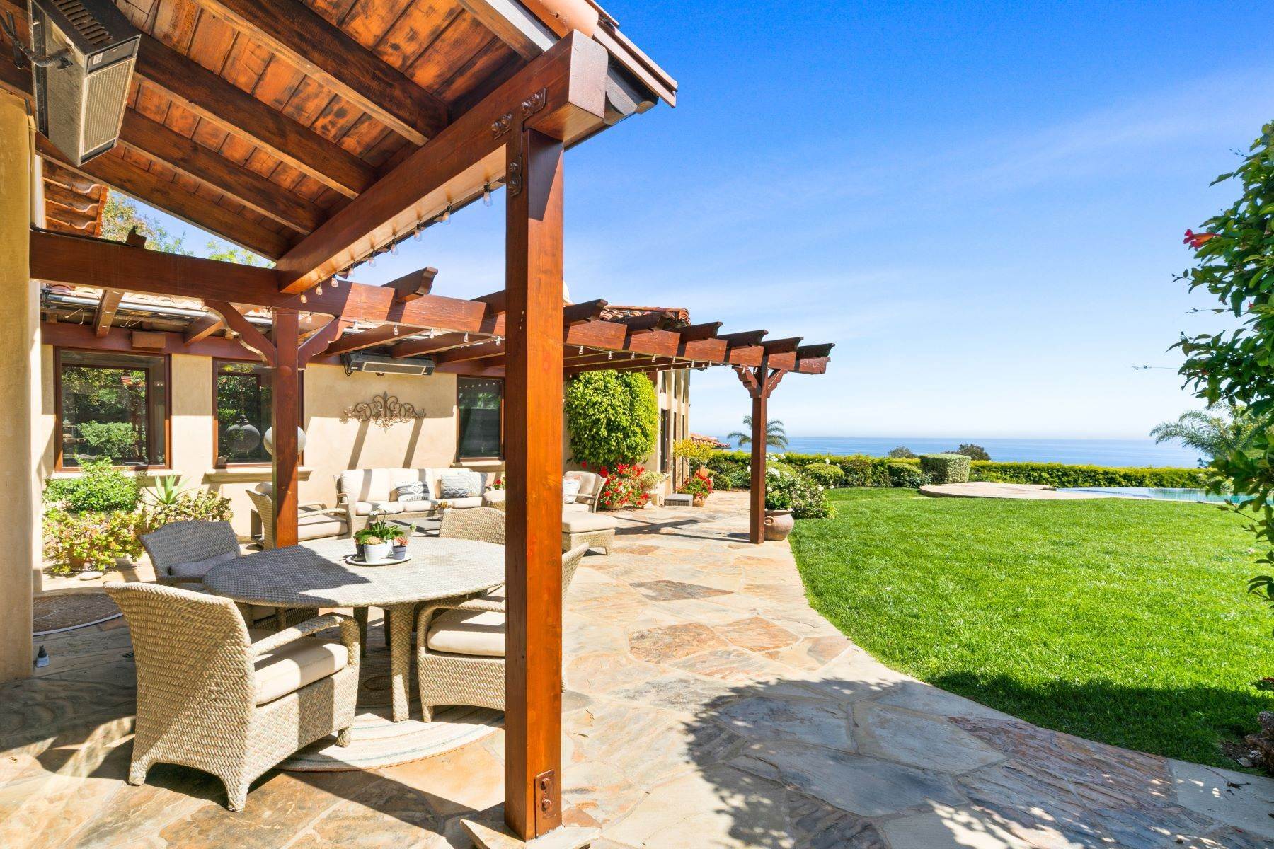 20. Single Family Homes for Sale at Beautiful Spanish Hacienda-Style Home 22560 Carbon Mesa Road Malibu, California 90265 United States
