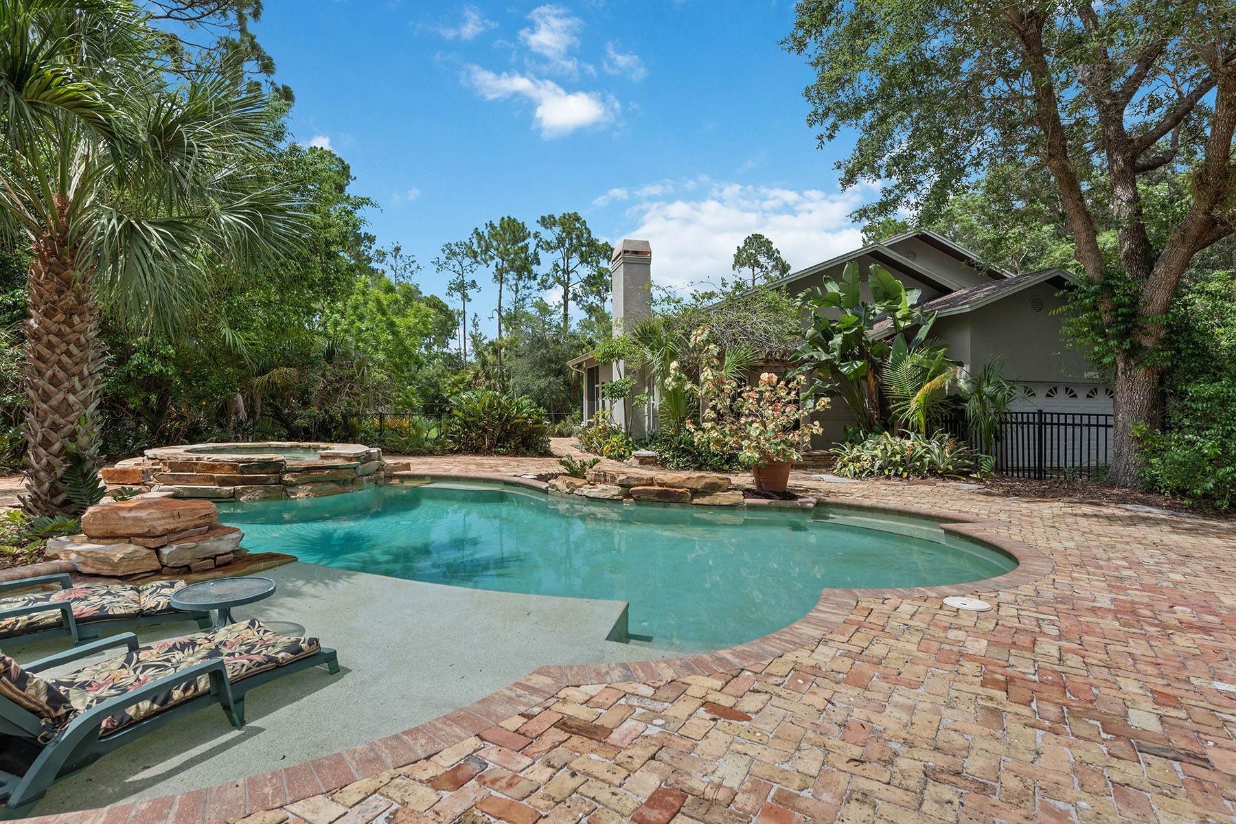 Single Family Homes for Sale at 5881 Bur Oaks Lane Naples, Florida 34119 United States