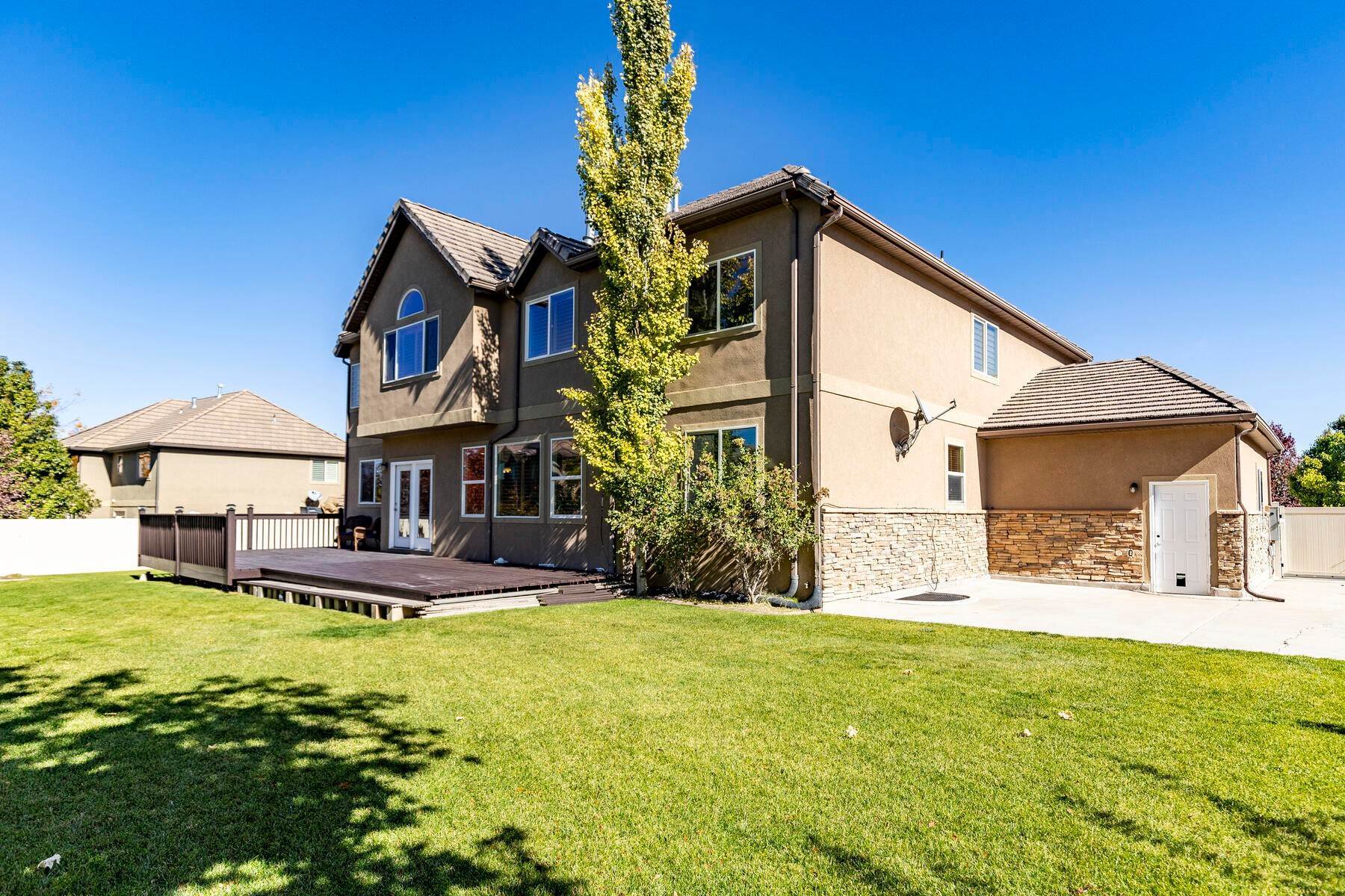25. Single Family Homes for Sale at This Herriman Cove Home Offers Proximity to a Pond, Trails, and a Community Pool 14394 S Long Ridge Drive Herriman, Utah 84096 United States